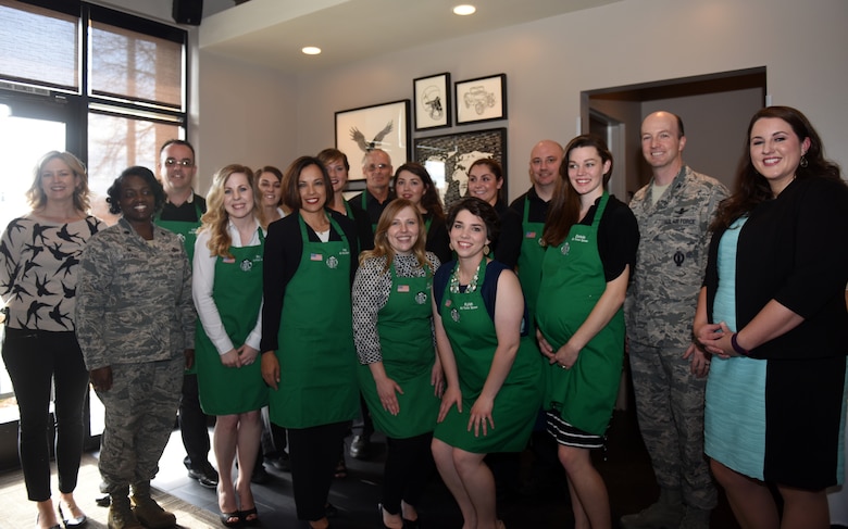 Leadership from Vandenberg Air Force Base and military spouses and veterans employed at Starbucks, pose for a group photo during a Military Family Store dedication, Feb. 18, 2016, at Starbucks in Lompoc, Calif. Because of the successful partnership between Vandenberg AFB and Starbucks, and the hiring efforts on a local level, the Lompoc Starbucks was recently dedicated as a Military Family Store. (U.S. Air Force photo by Senior Airman Kyla Gifford/Released)