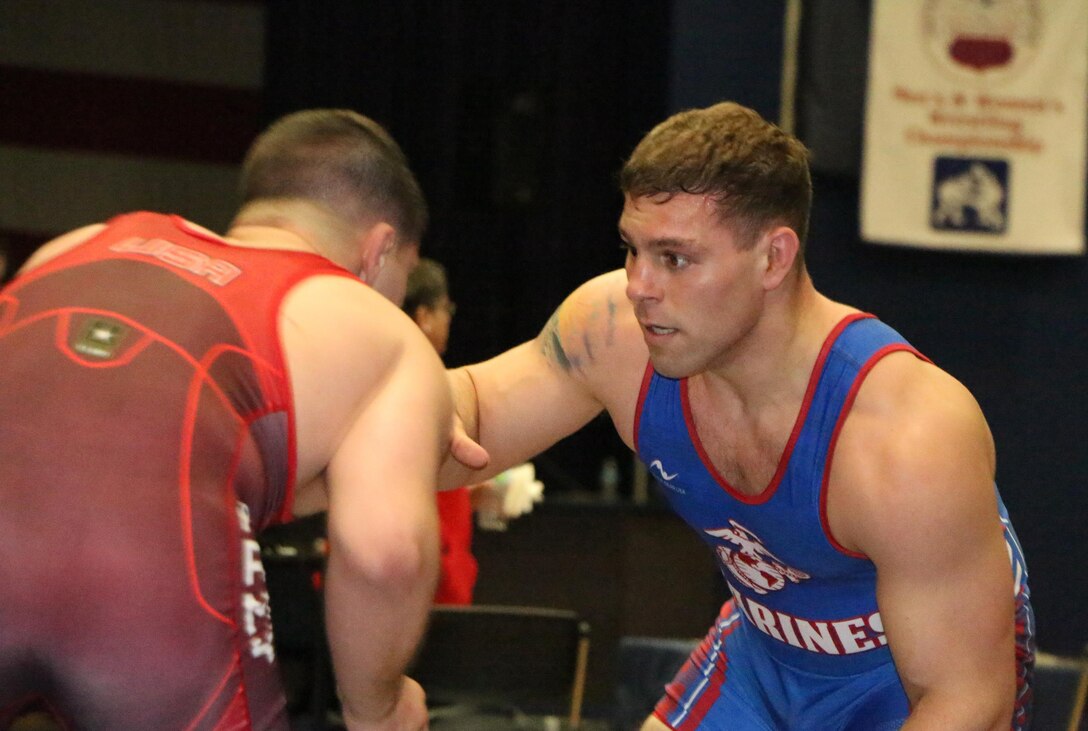 Marine 1st Lt. Daniel Miller (blue) of Camp Lejeune, N.C. defeats Army Pfc. Lucas Sheridan (red) of Fort Carson, Colo. wins Armed Forces gold in the 97kg Freestyle competition of the 2016 Armed Forces Wrestling Championship held at Naval Base Kitsap, Wash. 20-21 February 2016.  