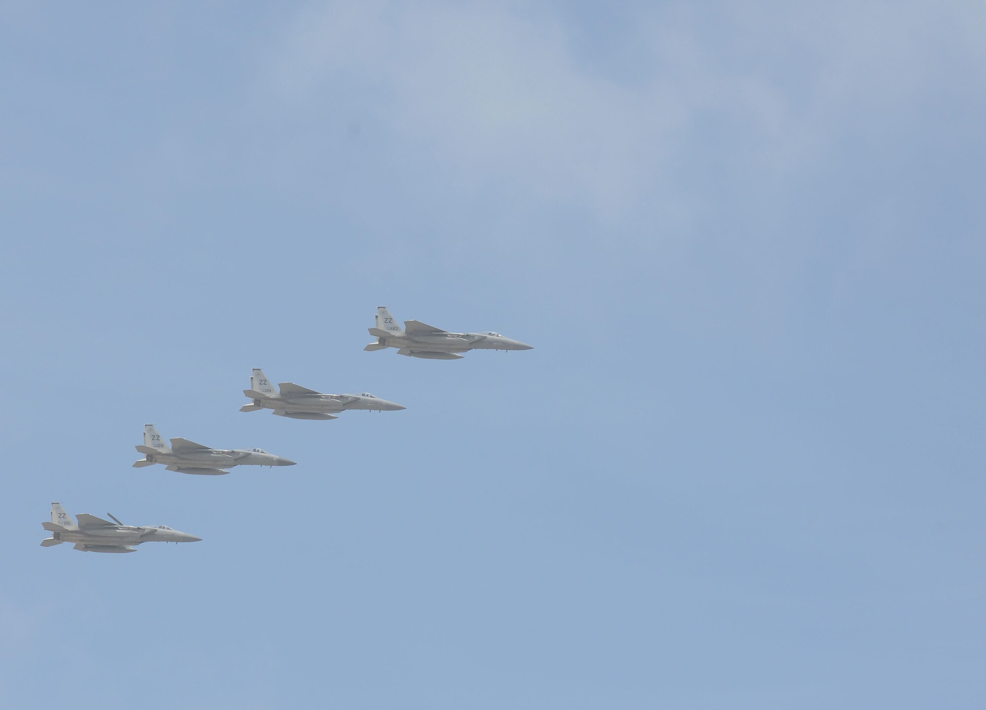 F-15 Eagles fly in formation Feb. 20 during the 2016 Pacific Air Partners Open House at Andersen Air Force Base, Guam. The open house showcased the things Airmen do and the capabilities of some of the world's strongest air forces. (U.S. Air Force photo/Airman 1st Class Arielle Vasquez)