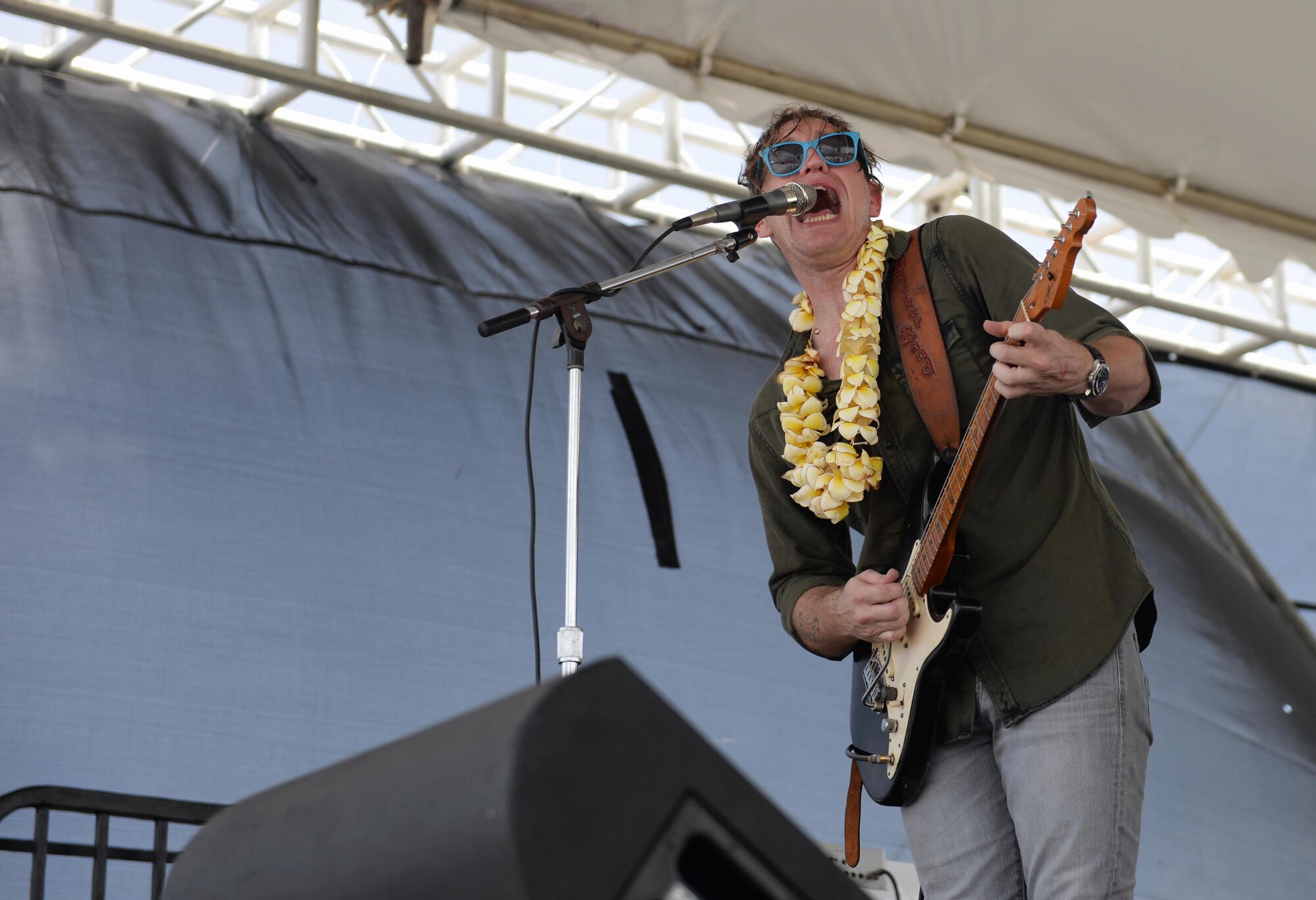 Chris Walker plays for attendees of the 2016 Pacific Air Partners Open House Feb. 20 at Andersen Air Force Base, Guam. In addition to the Chris Walker Band, attendees of the open house were able to experience musical acts from Full Sprectrum and Rumblefish. (U.S. Air Force photo/Airman 1st Class Jacob Skovo)