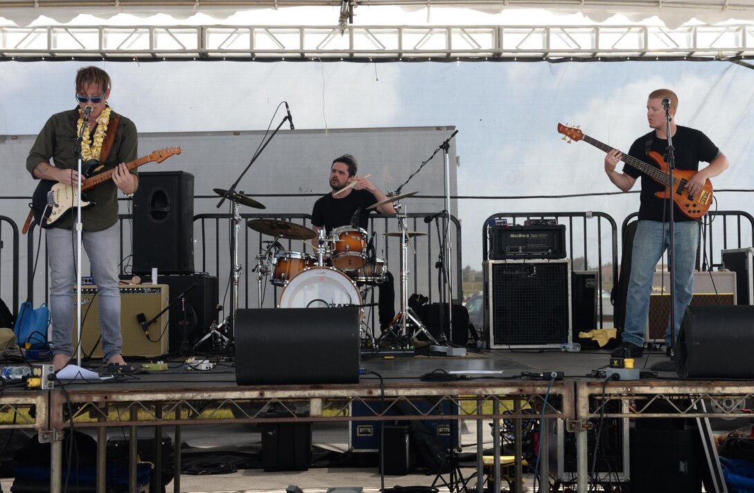 The Chris Walker Band plays for attendees of the 2016 Pacific Air Partners Open House Feb. 20 at Andersen Air Force Base, Guam.
In addition to the Chris Walker Band, attendees of the open house were able to experience musical acts from Full Sprectrum and Rumblefish. (U.S. Air Force photo/Airman 1st Class Jacob Skovo)
