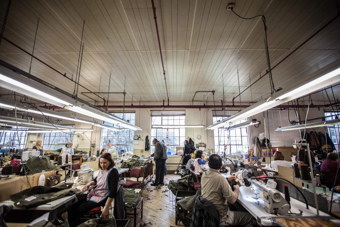 The 18th Sergeant Major of the Marine Corps, Ronald L. Green, visits personnel with Crown Clothing Company in Vineland, NJ, Feb. 17, 2016. The company is responsable for producing the Marine Corps with the Dress Blue and Service Alpha jackets.  (U.S. Marine Corps photo by Sgt. Melissa Marnell, Office of the Sergeant Major of the Marine Corps/Released)