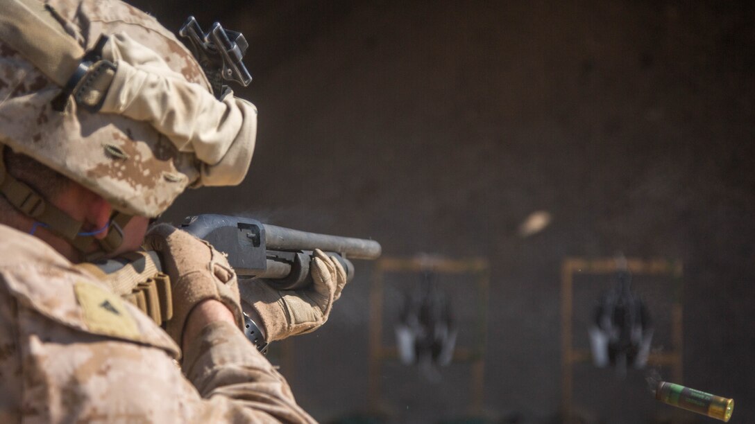 U.S. Marine Corps Lance Cpl. Kyle Durkee with Charlie Company, 1st Battalion, 7th Marine Regiment, attached to Special Purpose Marine Air-Ground Task Force-Crisis Response-Central Command, fires a Remington M870 12-gauge pump shotgun as part of non-lethal weapons training at an undisclosed location in Southwest Asia, Feb. 2, 2016. SPMAGTF-CR-CC Marines hone skills in the event of non-lethal combatant operations. 