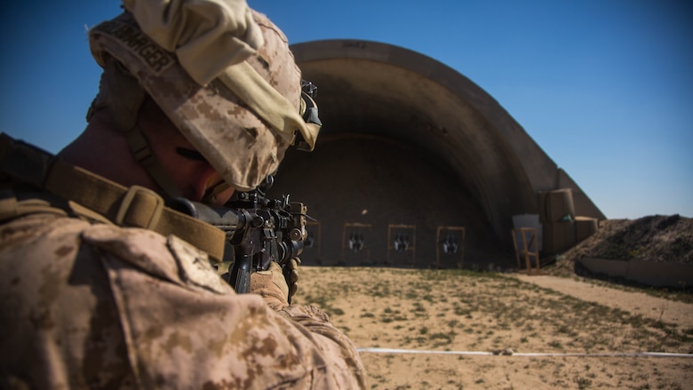 U.S. Marine Corps Lance Cpl. David Shellarbarger with Charlie Company, 1st Battalion, 7th Marine Regiment, attached to Special Purpose Marine Air-Ground Task Force-Crisis Response-Central Command, fires an M203 grenade launcher as part of non-lethal weapons training at an undisclosed location in Southwest Asia, Feb. 2, 2016. SPMAGTF-CR-CC Marines hone their skills in the event of non-lethal combatant operations. 