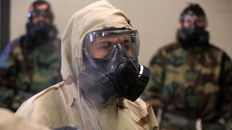 Cpl. Alyson Conchar gives Marines with Marine Aviation Logistics Squadron 14 instructions during gas chamber training at Marine Corps Air Station Cherry Point, N.C., Feb. 10, 2016. Marines in the gas chamber faced the CS gas as part of their qualification to familiarize themselves with the equipment and skills if faced with a biochemical attack. Marines of every military occupational specialty must be proficient with the equipment as it is part of every Marines’ basic skills. Conchar is a Chemical, Biological, Radiologicl and Nuclear defense specialist. 