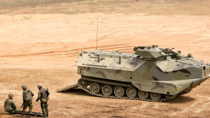 Royal Thai Marines and an amphibious assault vehicle simulate a casualty evacuation during a combined arms live fire exercise at Ban Chan Khrem, Thailand, during exercise Cobra Gold, Feb. 18, 2016. Cobra Gold  is a multinational training exercise developed to strengthen security and interoperability between the Kingdom of Thailand, the U.S. and other participating nations. 