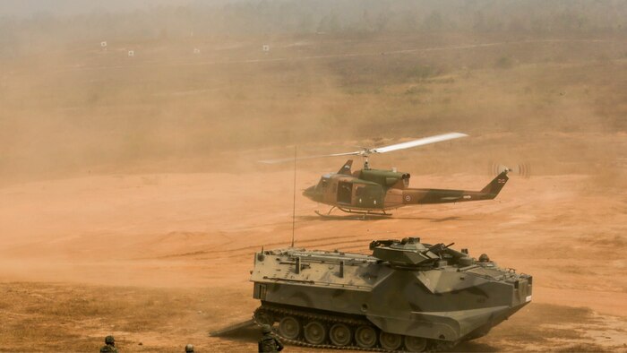 Royal Thai Marines, amphibious assault vehicles, and a Bell 212 simulate a casualty evacuation during a combined arms live fire exercise at Ban Chan Khrem, Thailand, during exercise Cobra Gold, Feb. 18, 2016. Cobra Gold is a multinational training exercise developed to strengthen security and interoperability between the Kingdom of Thailand, the U.S. and other participating nations. 