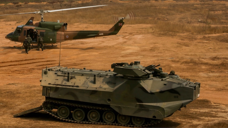 Royal Thai Marines, amphibious assault vehicles, and a Bell 212 simulate a casualty evacuation during a combined arms live fire exercise at Ban Chan Khrem, Thailand, during exercise Cobra Gold, Feb. 18, 2016. Cobra Gold  is a multinational training exercise developed to strengthen security and interoperability between the Kingdom of Thailand, the U.S. and other participating nations. 