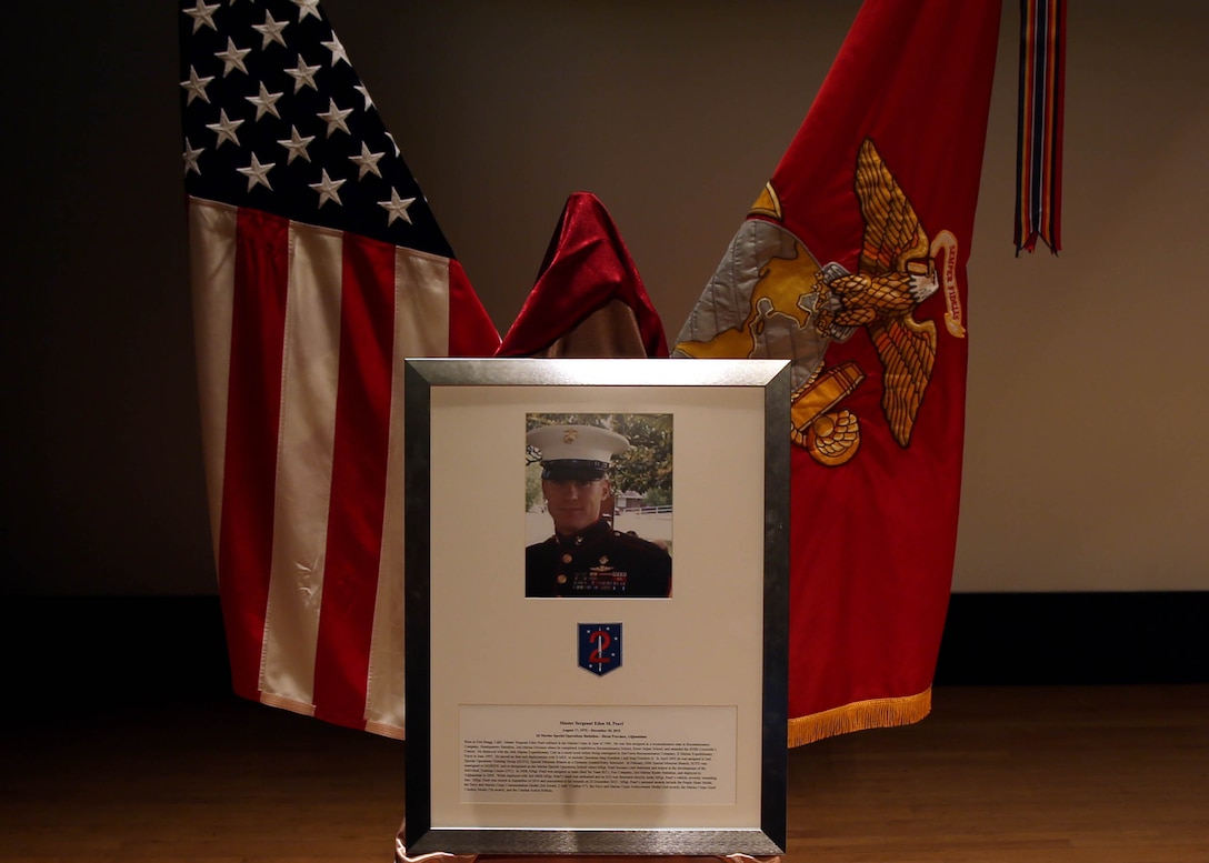 The plaque honoring Master Sgt. Eden M. Pearl was unveiled at the Celebration of Life ceremony at the Base Theater aboard Marine Corps Base Camp Lejeune, N.C., Feb. 19, 2016. The plaque will be displayed on the Hall of Honor at U.S. Marine Corps Forces, Special Operations Command headquarters building aboard Stone Bay, N.C.