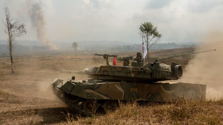 A Republic of Korea K1 tank move towards their objectives during a combined arms live fire exercise at Ban Chan Khrem, Thailand, during exercise Cobra Gold, Feb. 19, 2016. Cobra Gold is a multinational training exercise developed to strengthen security and interoperability between the Kingdom of Thailand, the U.S. and other participating nations. 