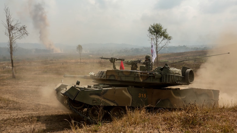 A Republic of Korea K1 tank move towards their objectives during a combined arms live fire exercise at Ban Chan Khrem, Thailand, during exercise Cobra Gold, Feb. 19, 2016. Cobra Gold is a multinational training exercise developed to strengthen security and interoperability between the Kingdom of Thailand, the U.S. and other participating nations. 