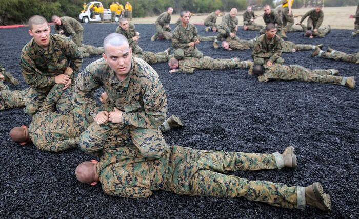 A recruit of Golf Company, 2nd Recruit Training Battalion, executes a basic wristlock during a Marine Corps Martial Arts Program session at Marine Corps Recruit Depot San Diego, Feb. 18. Being able to properly execute each technique is crucial, especially when they take the MCMAP test later in training. Annually, more than 17,000 males recruited from the Western Recruiting Region are trained at MCRD San Diego. Golf Company is scheduled to graduate April 29.