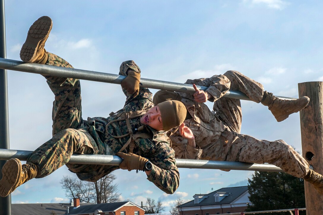 Marine Corps officer candidates complete the obstacle course at Brown Field on Marine Corps Base Quantico, Va., Feb. 11, 2016. The candidates are assigned to Delta Company, Officer Candidates Class 221. Marine Corps photo by Cpl. Patrick H. Owens
