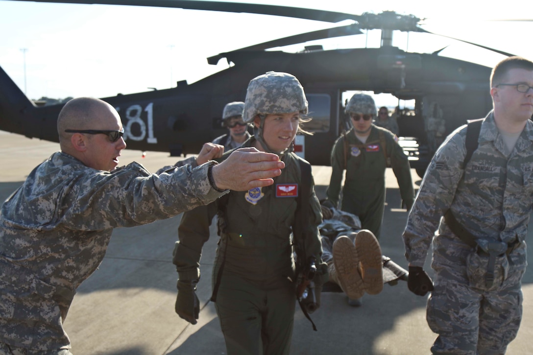 U.S. and Canadian forces conduct joint medevac training at Alexandria International Airport in Alexandria, La., before moving into a rotation at Joint Readiness Training Center on Fort Polk, La., Feb. 13, 2016. Army photo by Staff Sgt. Brian Ragin