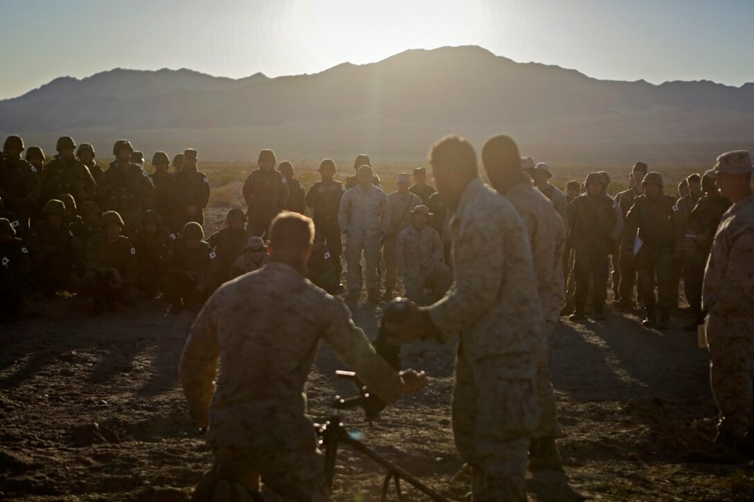 Marines assigned to Weapons Company, 1st Battalion, 4th Marine Regiment, 1st Marine Division, demonstrate the misfire procedures for an 81 mm mortar system during Exercise Iron Fist 2016 aboard Marine Corps Air Ground Combat Center Twentynine Palms, Calif., Feb. 9, 2016. Iron Fist is an annual, bi-lateral training exercise between the Japan Ground Self Defense Force and Marines to strengthen warfighting capabilities from ship to shore.
