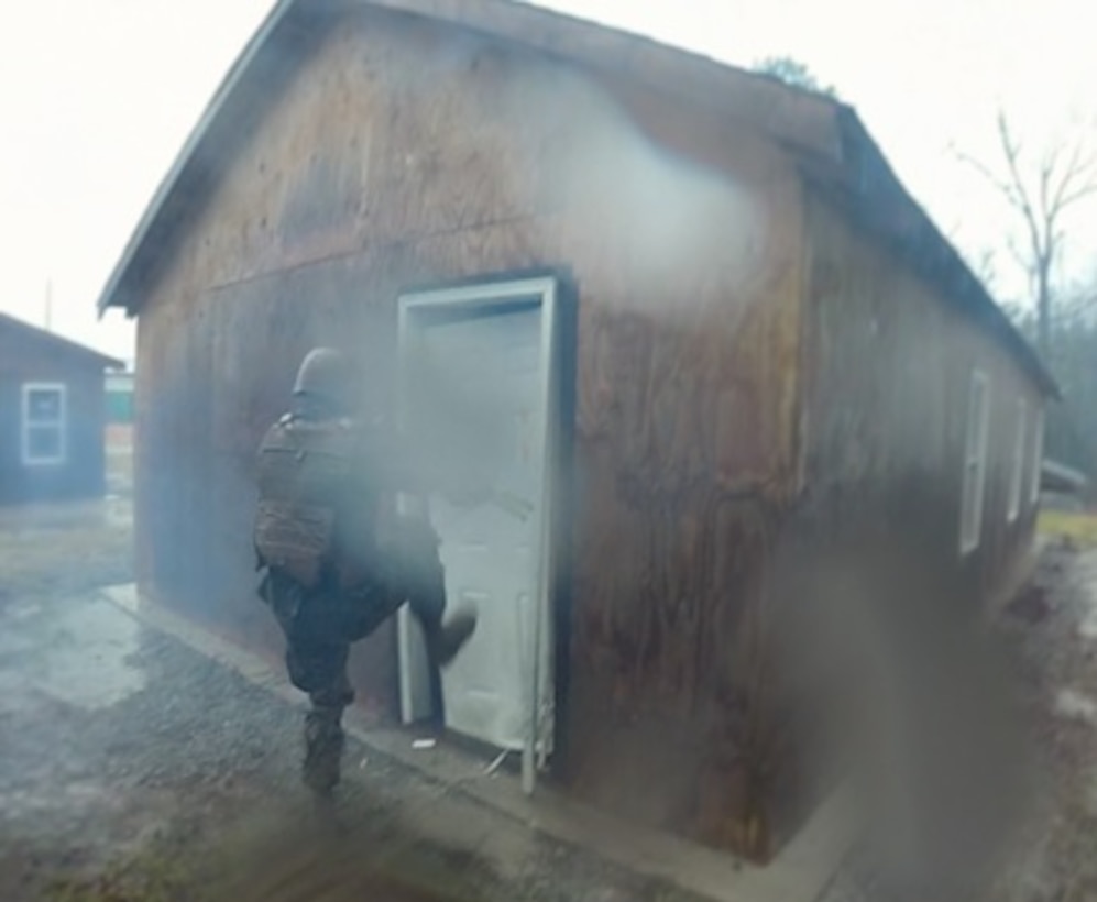 On February 5, 2016 Second Lieutenant Ryan Gibbs, a Marine from Colorado Springs, Colorado attached to Combat Engineer Officer course 2-16 (CEO 2-16); clears a door that was breached by a Uli Knot Slider charge at the new shot houses at the Engineer Training Complex as part of the urban breacher class. 
