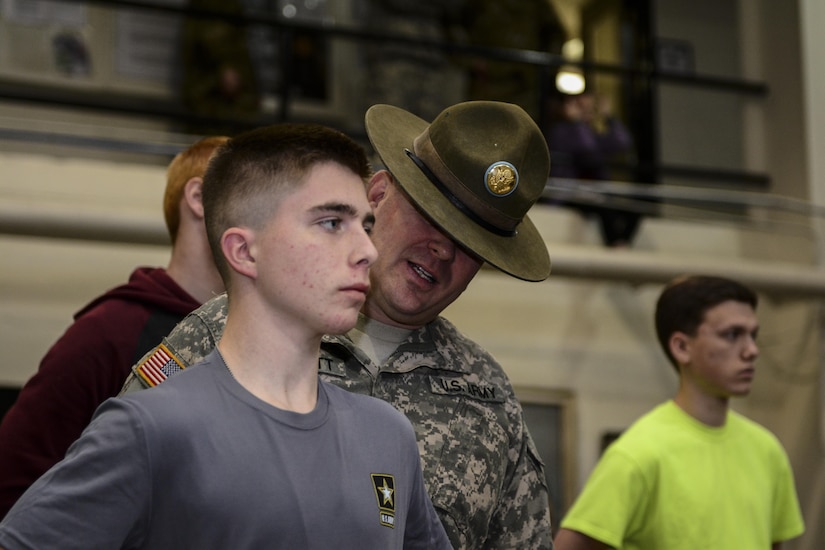 Army Reserve Drill Sergeant, Staff Sgt. Michael Merritt, 1st Battalion, 518th Infantry Regiment, questions a Soldier in formation during Future Soldier Day at the Reserve Center in Asheville, N.C., Feb. 20, 2016. The event was hosted by 1st Battalion, 518th Infantry Regiment and gives future Soldiers in the Army and Army Reserve an introduction to basic Warrior Tasks but more importantly gives the Reserve drill sgts. of the unit a chance to brush up on their skills as they gear up for their annual training mission in the basic combat training companies. (U.S. Army photo by Sgt. 1st Class Brian Hamilton)
