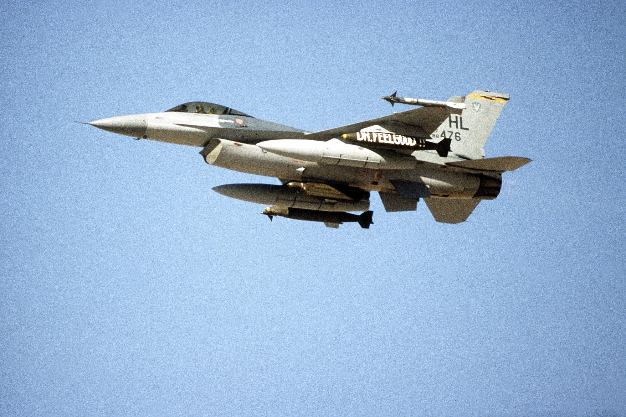 An F-16C Fighting Falcon aircraft of the 388th Tactical Fighter Wing flies out on a mission during Operation Desert Storm. The aircraft is armed with AIM-9 Sidewinder missiles and Mark 84 2,000-pound bombs. (U.S. Air Force photo)