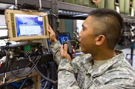 Spc. Adrian Quidachay, Signal Company, Headquarters and Headquarters Battalion, 25th Infantry Division, conducts data and chat communications with a Mobile User Objective System &#40;MUOS&#41; Feb. 18 on Schofield Barracks, Hawaii. The MUOS is military communications satellite that supports worldwide, multi-service users.