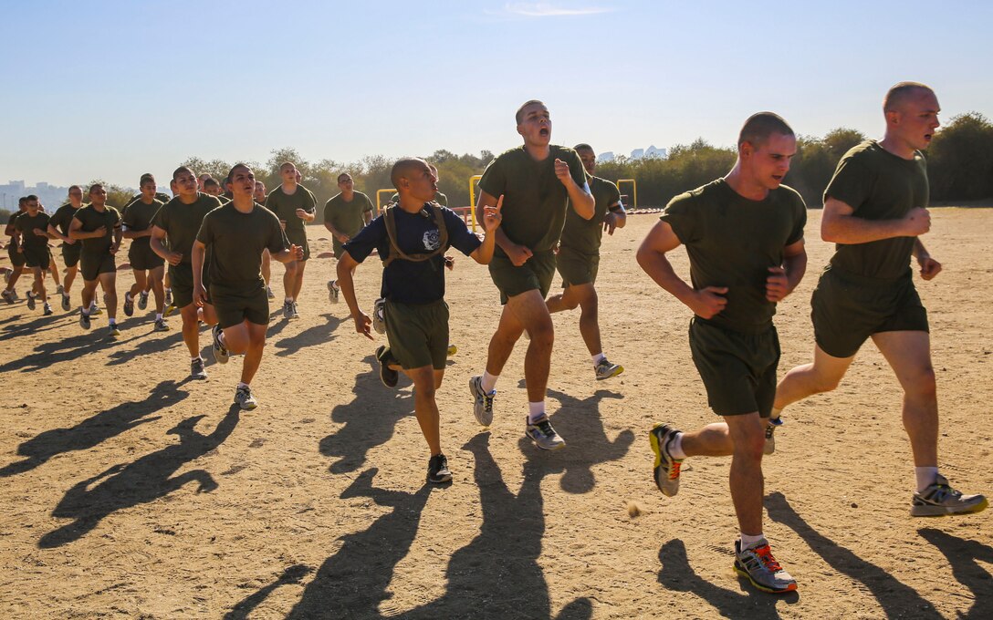 Recruits of Kilo Company, 3rd Recruit Training Battalion, conduct sprint drills during a physical training session at Marine Corps Recruit Depot San Diego, Feb. 22. If the recruits moved slowly, drill instructors motivated them to move faster and to get the most out of the session. Annually, more than 17,000 males recruited from the Western Recruiting Region are trained at MCRD San Diego. Kilo Company is scheduled to graduate May 6.