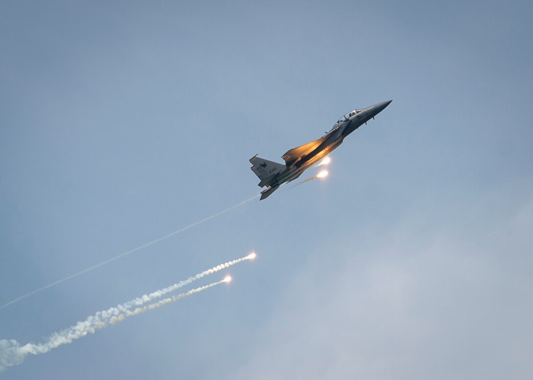 A Republic of Singapore Air Force F-15SG Strike Eagle deploys flares as part of an aerial demonstration during the Singapore International Airshow at Changi International Airport, Singapore, Feb. 21, 2016. Singapore is a strong partner with the U.S. that provides mutual training and cooperation opportunities between the two nations’ military forces. (U.S. Air Force photo by Capt. Raymond Geoffroy/Released)