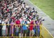 A crowd of spectators watch as a U.S. Air Force C-17 Globemaster III performs an aerial demonstration during the Singapore International Airshow, at Changi International Airport, Singapore, Feb. 20, 2016. The show is focused on building strong relations between Singapore, U.S. and the international community. (U.S. Air Force photo by Capt. Raymond Geoffroy/Released)