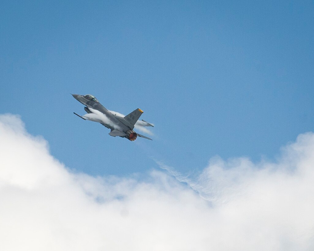 A U.S. Air Force F-16C Fighting Falcon from the 35th Fighter Wing, Misawa Air Base, Japan, performs an aerial demonstration during the Singapore International Airshow, at Changi International Airport, Singapore, Feb. 21, 2016. The show was an opportunity for the U.S. to demonstrate flexible combat capabilities and to deter adversaries, while reassuring allies and partners. (U.S. Air Force photo by Capt. Raymond Geoffroy/Released)