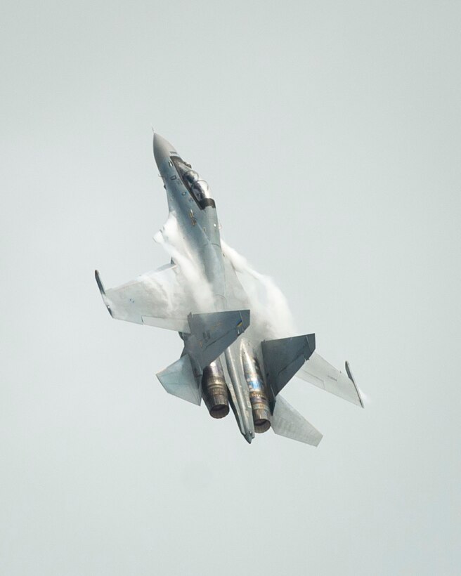 A Royal Malaysian Air Force Su-30MKM performs an aerial demonstration during the Singapore International Airshow, at Changi International Airport, Singapore, Feb. 21, 2016. During the show, several nations came together to demonstrate their aerial capabilities and build stronger defense ties. (U.S. Air Force photo by Capt. Raymond Geoffroy/Released)
