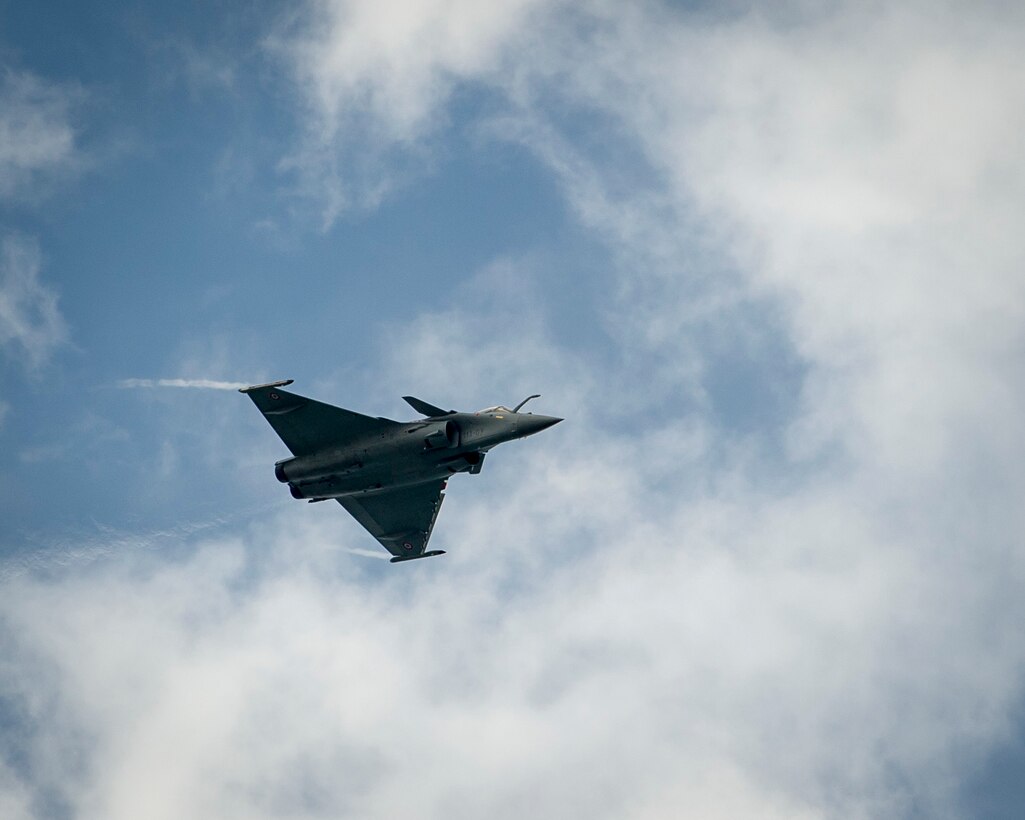 A French air force Rafale performs an aerial demonstration during the Singapore International Airshow at Changi International Airport, Singapore, Feb. 21, 2016. During the show, several nations came together to demonstrate their aerial capabilities and build stronger defense ties. (U.S. Air Force photo by Capt. Raymond Geoffroy/Released)
