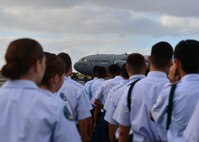 Students from Aiea High School’s Air Force Junior Reserve Officer Training Corps prepare to walk across the flight line on Joint Base Pearl Harbor-Hickam, Hawaii, Feb 18, 2016. The 30 JROTC students toured a C-17 Globemaster III and visited the 647th Explosive Ordnance Disposal unit and the 647th Security Forces Squadron's military working dog kennel during their visit to JBPHH. (U.S. Air Force photo by Tech. Sgt. Aaron Oelrich/Released) 
