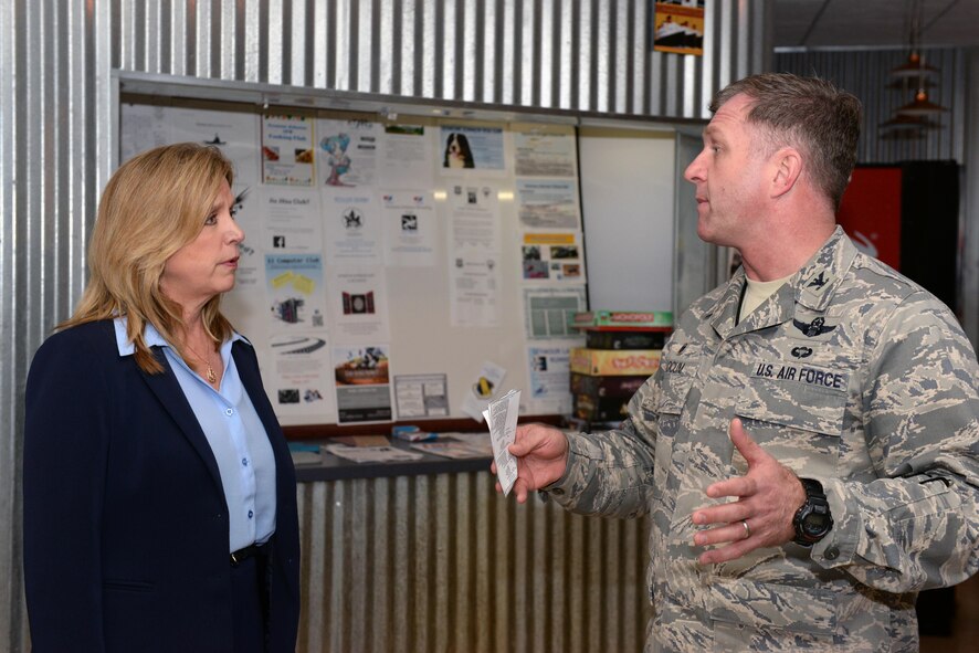 Col. Mark Slocum, 4th Fighter Wing commander, briefs the Honorable Deborah Lee James, Secretary of the Air Force, about the Make It Better Initiative, Feb. 18, 2016, at Seymour Johnson Air Force Base, North Carolina. Slocum explained how the initiative has improved Airman morale through club activities, community involvement and improvements to the installation. (U.S. Air Force photo/Airman 1st Class Ashley Williamson)