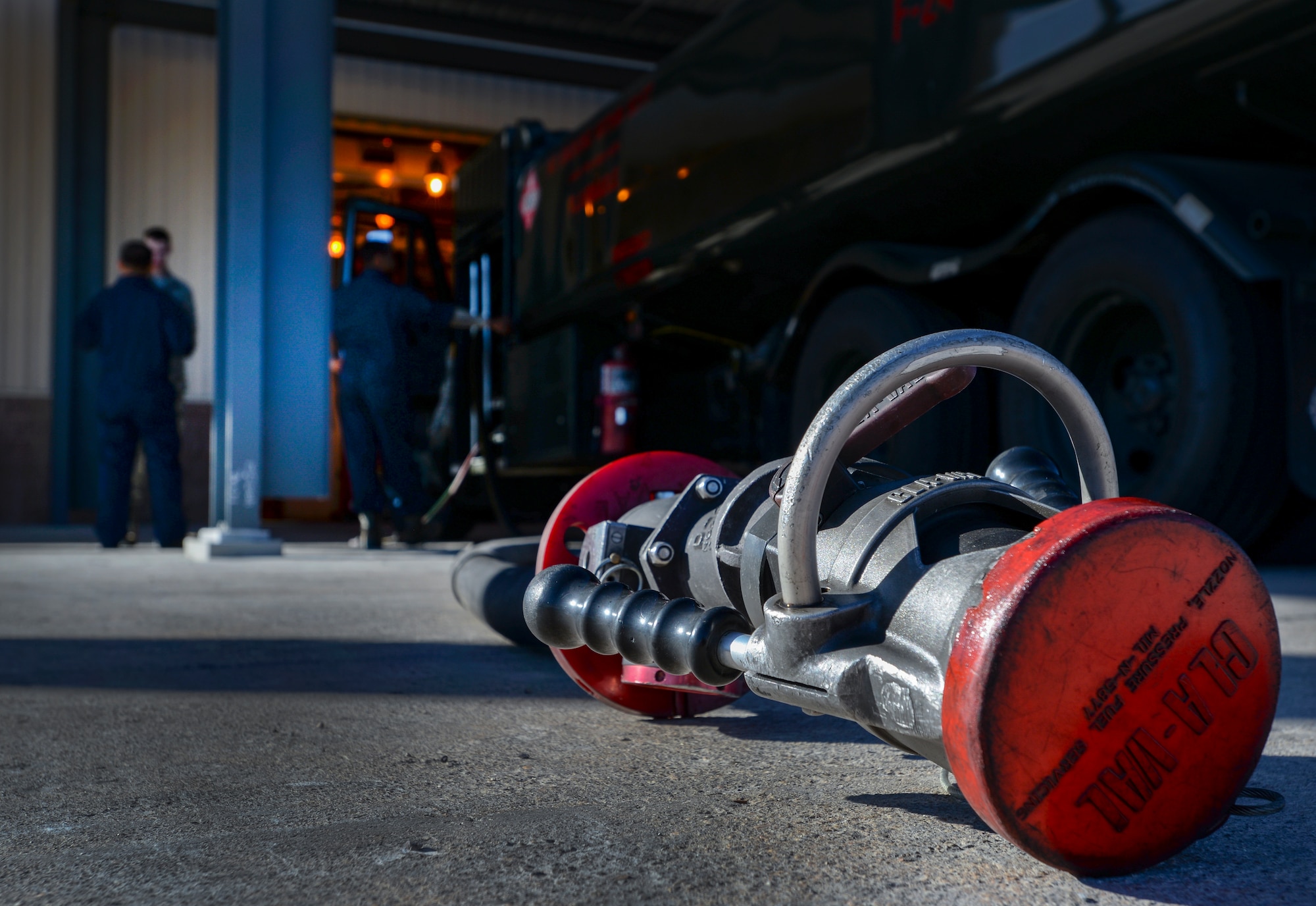 Airmen assigned to the 99th Logistics Readiness Squadron vehicle maintenance unit finish up an inspection on the hose of an R-11 refueling truck Feb. 16, 2016 at Nellis AFB, Nev.  This small unit, usually made up of four Airmen and one civilian contractor, has the vital mission of supporting flight line activity by performing bumper to bumper maintenance on the refueling trucks to make sure they are in service and ready to go out to the flight line at any time. (U.S. Air Force photo by Airman 1st Class Kevin Tanenbaum)