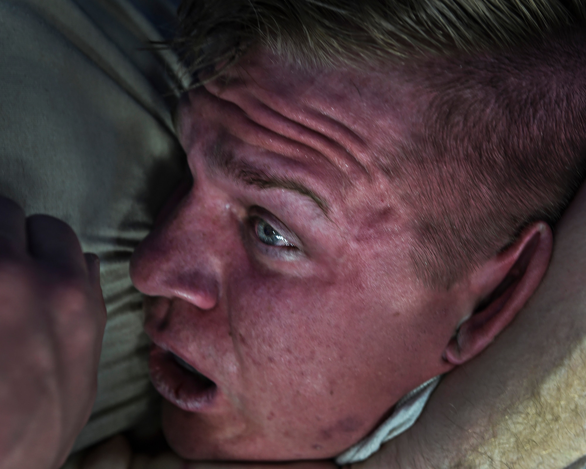 Master Sgt. Andrew 799th Security Forces Squadron first sergeant places Senior Airman Blake 799th SFS member a chokehold during a combatives class Feb. 19, 2016, at Creech Air Force Base, Nevada. Security Forces members train on defensive skills that will help them overcome dangerous situations in combat. (U.S. Air Force photo by Senior Airman Adarius Petty/Released)
