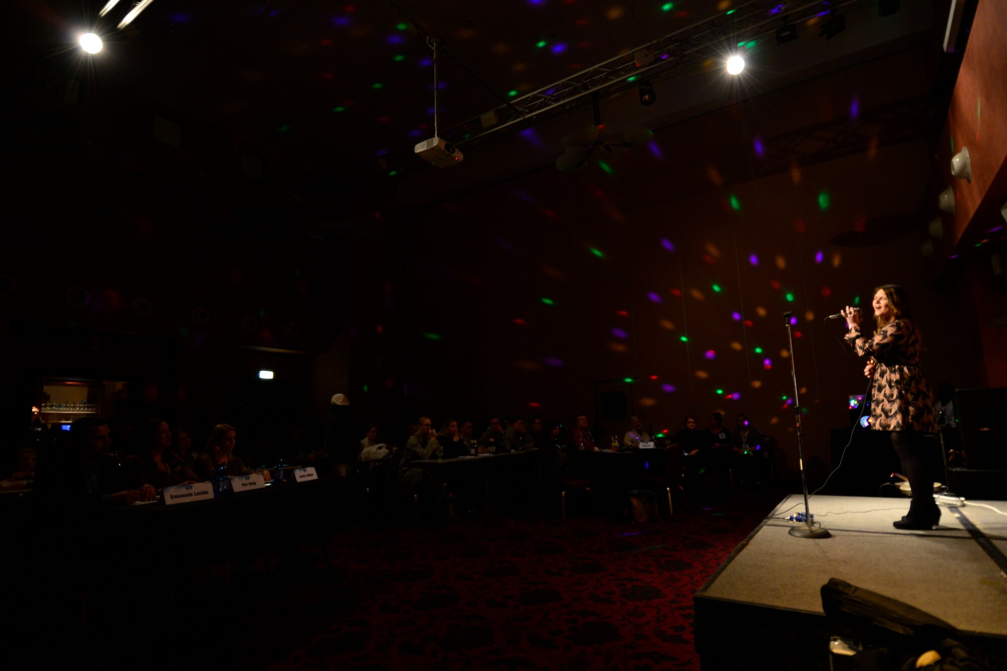 Kristen Crane performs during the Aviano Idol competition, Feb. 18, 2016, at Aviano Air Base, Italy. Ten vocalists performed during the first round of the competition where two individuals were eliminated by the judges. The second round of the competition will be held Feb. 25, 2016. (U.S. Air Force photo by Airman 1st Class Cory W. Bush/Released)