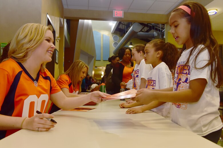 Denver Broncos cheerleaders hold cheer clinic for Buckley children