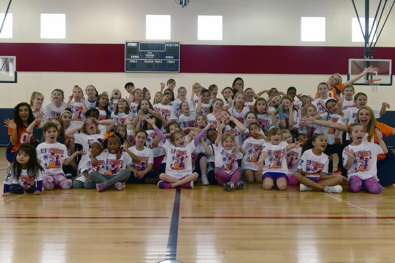 Denver Broncos cheerleaders hold cheer clinic for Buckley children