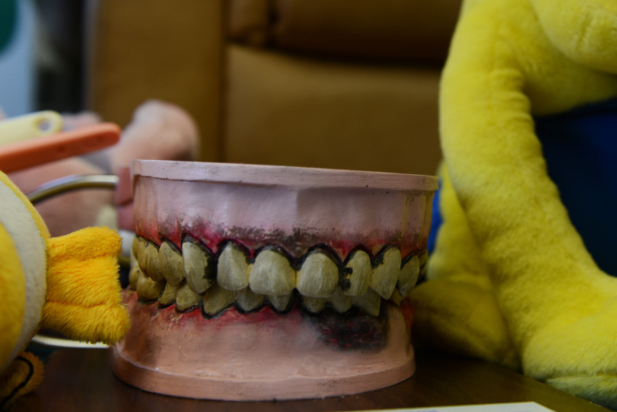 Members of the 673d Dental Squadron use props costumes, videos and other tools to educate children on the importance of dental hygiene during Children’s Dental Health Month. The American Dental Association recommends parents take their kids to the dentist before their first birthday. (U.S. Air Force photo by Airman 1st Class Javier Alvarez) 
