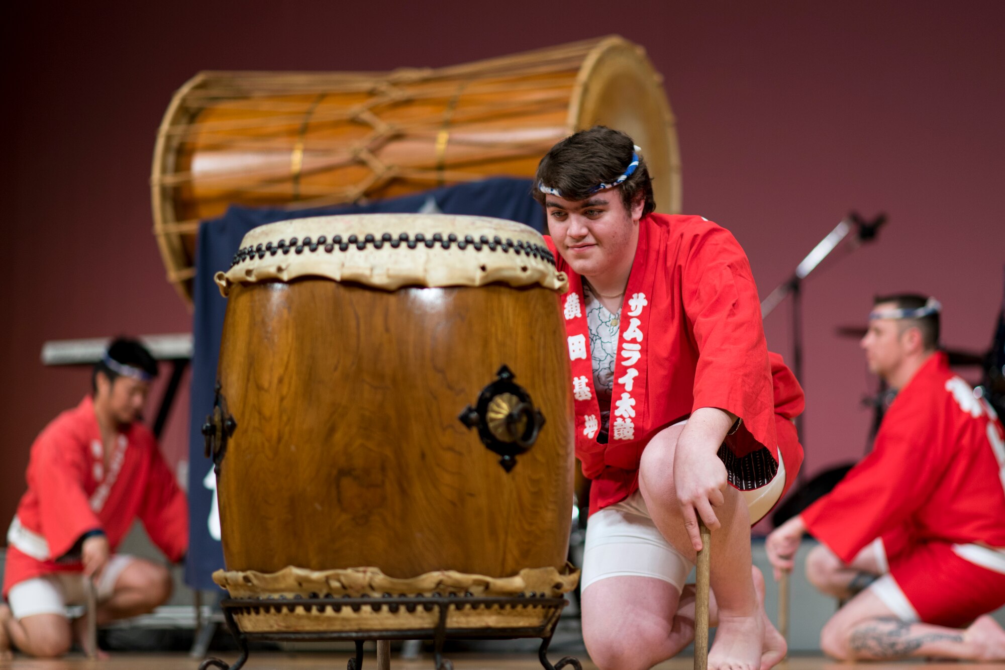 A member of the Yokota Air Base Samurai Taiko Team waits to perform during the Japan-U.S. Joint Concert at Kotori Hall in Akishima, Tokyo, Japan, Feb. 20, 2016. The North Kanto Defense Bureau hosted the event to help foster better relationships between Japanese and U.S. members. (U.S. Air Force photo by Staff Sgt. Michael Washburn/Released)