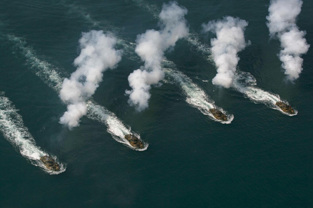 U.S., South Korean and Thai service members participate in an amphibious demonstration as part of Cobra Gold 16 in Utapao, Thailand, Feb. 12, 2016. Marine Corps photo by Cpl. William Hester