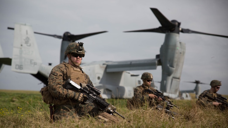 Marines with Charlie Company, Battalion Landing Team 1st Battalion, 5th Marines, 31st Marine Expeditionary Unit, secure their perimeter after disembarking from MV-22B Ospreys at Ie Shima Training Facility, Okinawa, Japan, Feb. 12, 2016. Marines and sailors with the 31st MEU flew from the USS Bonhomme Richard to Ie Shima for a vertical assault as part of amphibious integration training with the Navy ships of the Bonhomme Richard Amphibious Ready Group. The 31st MEU is currently deployed to the Asia-Pacific region. 