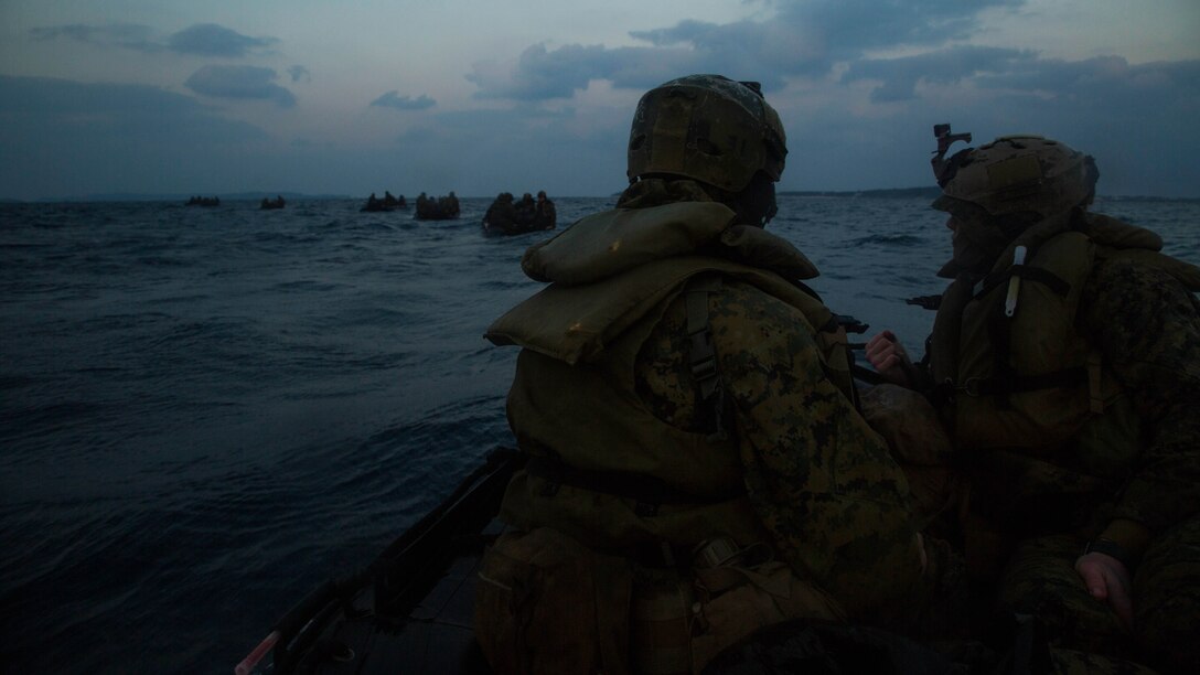 Marines with Bravo Company, Battalion Landing Team 1st Battalion, 5th Marines, 31st Marine Expeditionary Unit, line up behind other Combat Rubber Raiding Craft after launching from the USS Germantown for a boat raid, Feb. 16 , 2016. The Marines conducted the boat raid as part of the 31st MEU's amphibious integration training with the Navy ships of the Bonhomme Richard Amphibious Ready Group. The Marines and sailors of the 31st MEU are currently deployed to the Asia-Pacific region. 