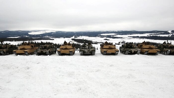 U.S. Marine Corps M1 Abrams tanks and Norwegian Leopard 2A4 Tanks rest in a field after training in Rena, Norway, Feb. 17, 2016. The Marines and Norwegian Army are working together as part of Exercise Cold Response, a joint NATO and allied country exercise comprised of 12 countries and approximately 16,000 troops. The U.S. European Command appreciates the opportunity for taking part in such a large multinational exercise at the invitation of our Norwegian Allies; and we are especially thankful for the chance to put our skills to the test in unique cold weather conditions.