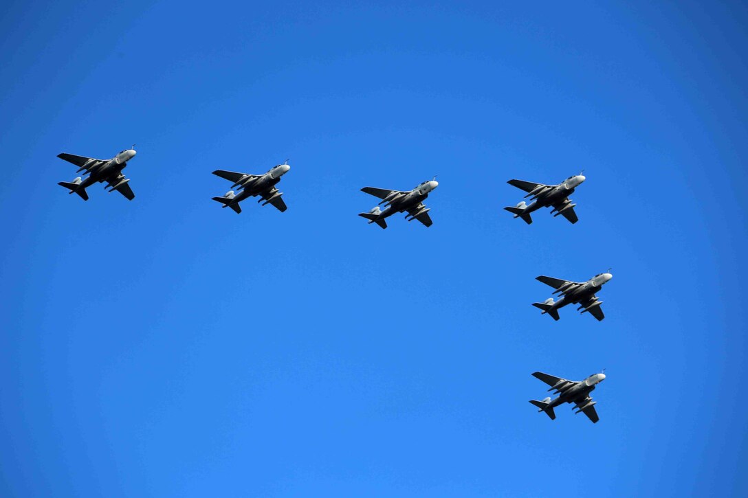 A squad of EA-6B Prowlers fly in a formation during a homecoming ceremony at Marine Corps Air Station Cherry Point, N.C., Feb. 16, 2016. Marines and Sailors with Marine Tactical Electronic Warfare Squadron 3 returned to the air station after a six-month deployment in support of the United States Pacific Command combatant commander, Marine Aircraft Group 12, 1st Marine Aircraft Wing with EA-6B expeditionary electronic warfare capabilities. (U.S. Marine Corps photo by Cpl. N.W. Huertas/Released)