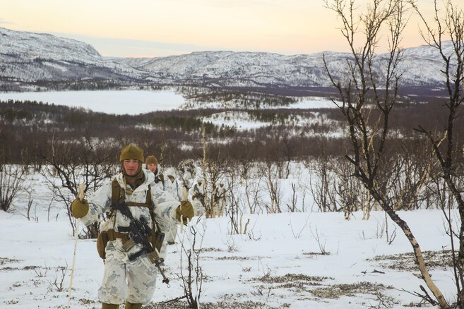 Marines with Black Sea Rotational Force march to the final assault position during the final exercise of cold-weather training aboard Porsangmoen, Norway, Feb. 16-20, 2016. Arctic training was conducted by U.K. Royal Marine Commando Mountain Leaders and hosted by the Norwegian military to improve the U.S. Marine Corps’ capability to support their NATO Allies in extreme environments. 