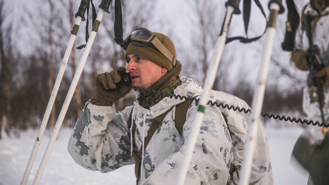 Capt. Jonathan Blankenship, a company commander with Black Sea Rotational Force, confirms the assault on the enemy objective is complete during the final exercise of cold-weather training aboard Porsangmoen, Norway, Feb. 16-20, 2016. Arctic training was conducted by U.K. Royal Marine Commando Mountain Leaders and hosted by the Norwegian military to improve the U.S. Marine Corps’ capability to support their NATO Allies in extreme environments. 