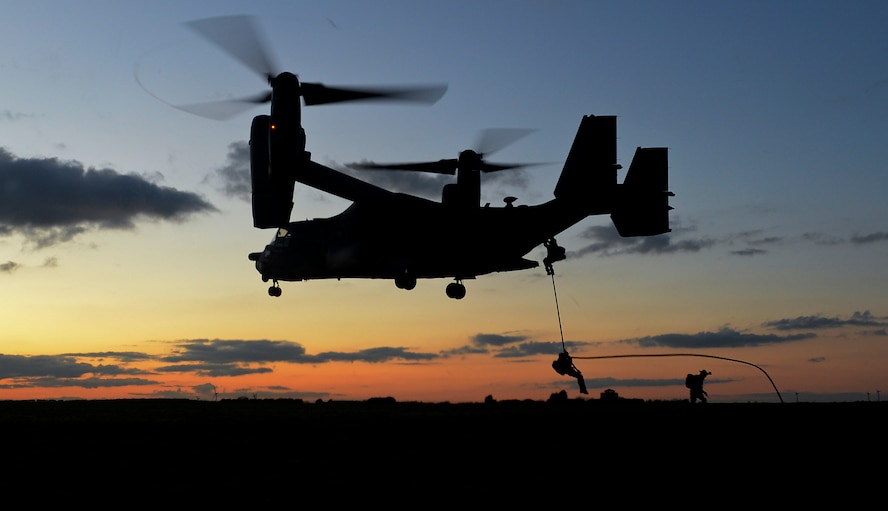 U.S. Air Force Air Commandos from the 352nd Special Operations Wing fast rope from a CV-22B Osprey currently assigned to the 7th Special Operations Squadron Feb. 11, 2016, during a routine training mission at RAF Sculthorpe in Norwich, England. The CV-22 Osprey is a tiltrotor aircraft that combines the vertical takeoff, hover and vertical landing qualities of a helicopter with the long-range, fuel efficiency and speed characteristics of a turboprop aircraft. Its mission is to conduct long-range infiltration, exfiltration and resupply missions for special operations forces. (U.S. Air Force photo by Staff Sgt. Micaiah Anthony/Released)
