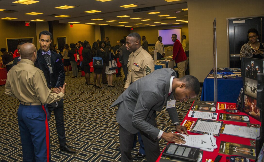 Marines with the 6th Marine Corps Recruiting District, Recruiting Station Baton Rouge, speak to college students during a Career Readiness Day function at the Hyatt Regency Hotel in New Orleans, Feb. 19, 2016. The CRD took place in conjunction with the United Negro College Fund National Alumni and National Pre-Alumni Council Leadership Conference. The CRD provides college students with sessions, workshops and job offers with select organizations including the Marine Corps. 