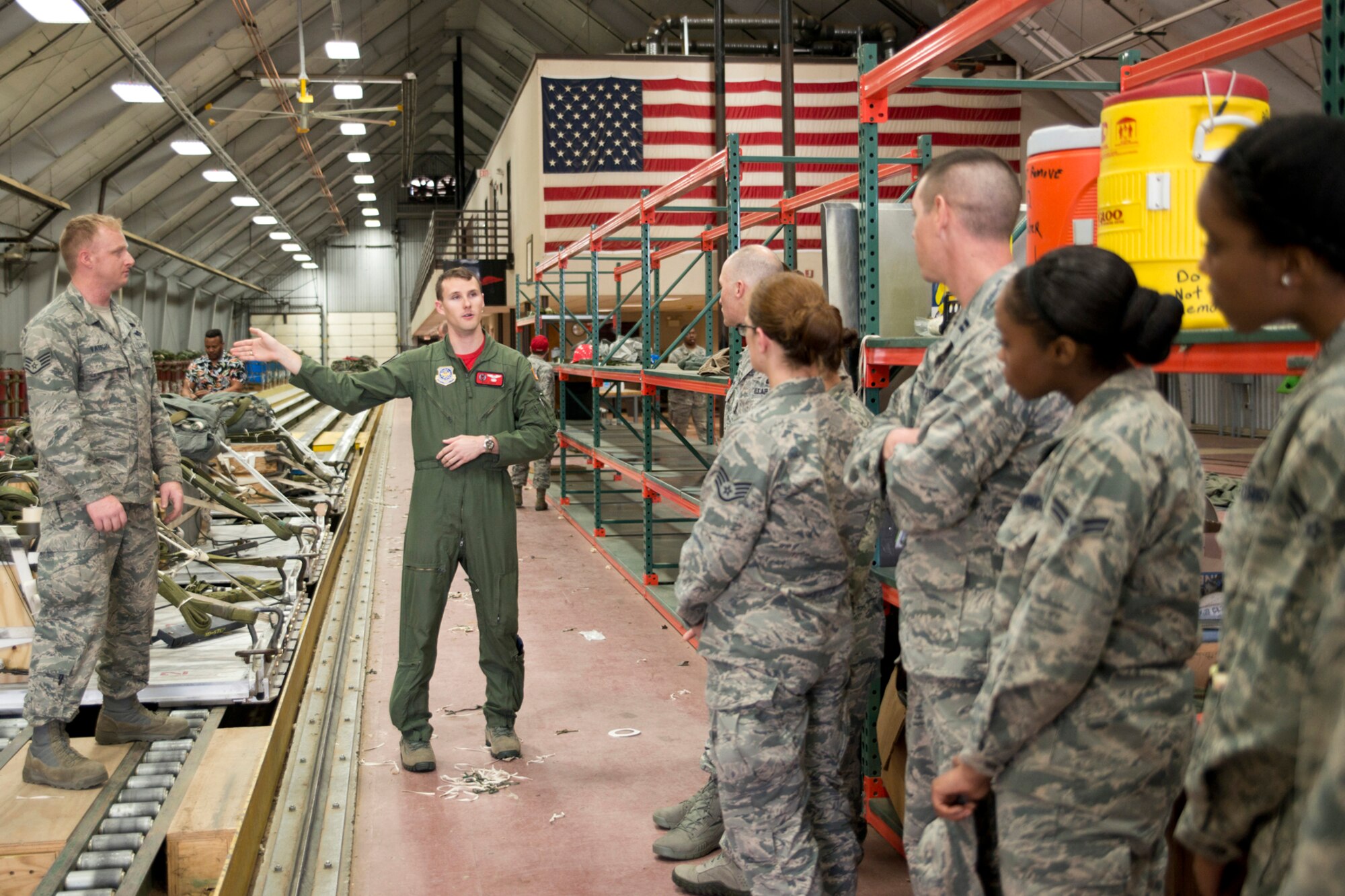 U.S. Air Force Capt. Kyle Capko, a pilot assigned to the 50th Airlift Squadron, explains how certain loads are dropped from a C-130 aircraft during a C-130 mission immersion tour at Little Rock Air Force Base, Ark., Feb. 19, 2016. Roughly 30 Airmen attended the event hosted by Lt. Col. James C. O’Brien III, the 50th Airlift Squadron commander, who wanted to show the Airmen how vital they are to the C-130 mission at Little Rock. (U.S. Air Force photo by Master Sgt. Jeff Walston/Released)   