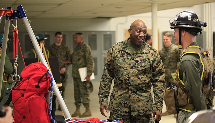 Sgt. Maj. Ronald L. Green, the 18th Sergeant Major of the Marine Corps, speaks to a Marine with Technical Rescue Platoon, React Force Company, Chemical Biological Incident Response Force (CBIRF) during an Initial Response Force static display in the battalion assembly room at CBIRF Headquarters, Naval Support Facility Indian Head, Feb. 18, 2016.
Green visited the Marines, sailors and civilians with CBIRF at Naval Support Facility Indian Head and Raymond M. Downey Responder Training Facility.
During Green’s visit, he received a CBIRF brief given by the CBIRF Commanding Officer, Col. Stephen E. Redifer, viewed a static display of an Initial Response Force set-up, talked to CBIRF personnel, toured the Downey Responder Training Facility and had lunch with CBIRF staff noncommissioned officers. 
When directed, CBIRF forward-deploys and/or responds with minimal warning to a chemical, biological, radiological, nuclear or high-yield explosive (CBRNE) threat or event in order to assist local, state, or federal agencies and the geographic combatant commanders in the conduct of CBRNE response or consequence management operations, providing capabilities for command and control; agent detection and identification; search, rescue, and decontamination; and emergency medical care for contaminated personnel. (Official USMC Photo by Sgt. Santiago G. Colon Jr./RELEASED)
