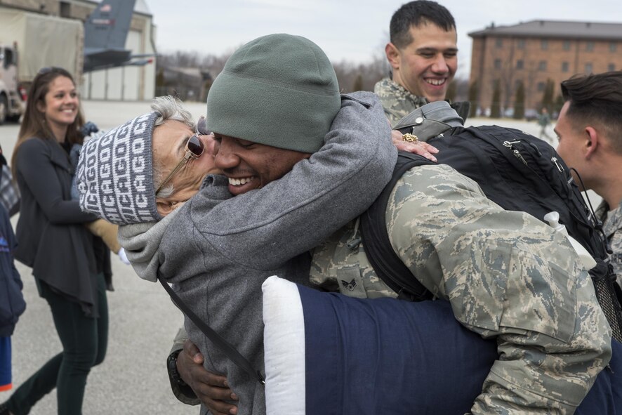 Jacqueline Buckley greets her grandson, Senior Airman Christopher Pledger, 434th Aircraft Maintenance Squadron crew chief, after returning to Grissom Air Reserve Base from a deployment to Southwest Asia Feb. 7, 2016. A total of 68 Airmen returned from a 4-month deployment in support of Operation Inherent Resolve. (U.S. Air Force photo/Tech. Sgt. Benjamin Mota)